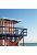 papier peint panoramique maison de plage rouge, blanc et bleu de ESTA home